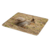 Niedliches Eichhörnchen isst ein Nussbaum-Foto Schneidebrett (Ecke)