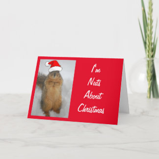 Niedliches Eichhörnchen mit einem Weihnachtshut Karte