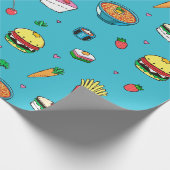 Niedliches, farbenfrohes Lebensmittelmuster auf bl Geschenkpapier (Ecke)