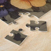 Niedliches Frettchen im Garten des Stiefmütterchen Puzzle (Seite)