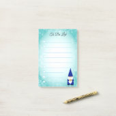 Niedliches Gnomen mit türkisfarbenen und weißen Li Post-it Klebezettel (Auf Schreibtisch)