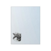 Niedliches graues Kaninchen gegen den blauen Himme Notizblock (Rotiert)