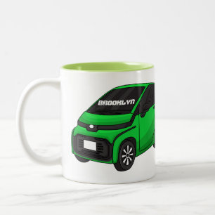 Niedliches grünes Kleinwagen Zweifarbige Tasse