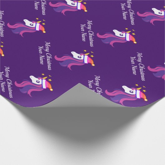 Niedliches, gürtelrosa Einhorn mit Weihnachtsmannm Geschenkpapier (Ecke)