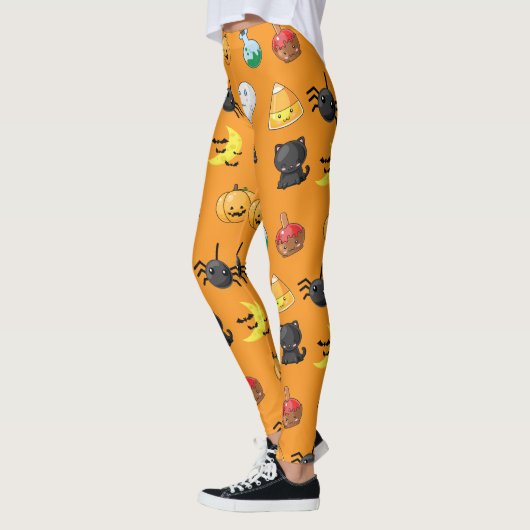 Niedliches Halloween-Muster mit orangefarbenem Hin Leggings (Links)