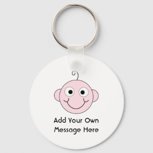 Niedliches lächelndes Baby. Kundenspezifischer Schlüsselanhänger