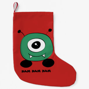 Niedliches lustiges grünes alien kleiner weihnachtsstrumpf