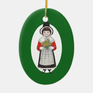 Niedliches Mädchen in traditioneller walisischer K Keramikornament