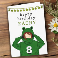 Niedliches Mädchen mit Green Frog Hoody Zeichnend