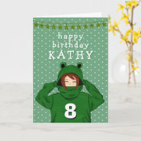 Niedliches Mädchen mit Green Frog Hoody Zeichnend 