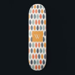 Niedliches Orange Blue Leafy Botanisches Monogramm Skateboard<br><div class="desc">Wenn Sie weitere Anpassungen benötigen,  schreiben Sie mir bitte an yellowfebstudio@gmail.com.</div>