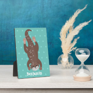 Niedliches Ottertauchen auf aquamariner Cartoon-Ab Fotoplatte