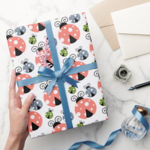 Niedliches rosa, blaues und grünes Ladybugs-Muster Geschenkpapier