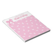 Niedliches rosa Bow-Muster vom Schreibtisch aus Notizblock (angewinkelt)