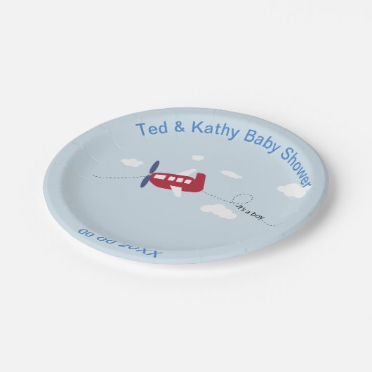 Niedliches rotes Flugzeug mit blauer Pappteller (Schrägansicht)