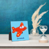 Niedliches rotes Flugzeug mit Cartoon Fotoplatte (InSitu)