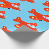 Niedliches rotes Flugzeug mit Cartoon Geschenkpapier (Ecke)