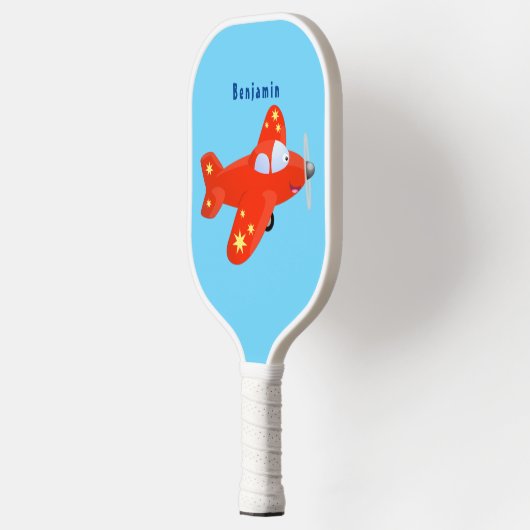 Niedliches rotes Flugzeug mit Cartoon Pickleball Schläger (Links)