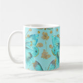Niedliches Schmetterlingsmuster auf blauem Hinterg Kaffeetasse (Links)