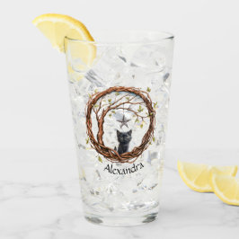 Niedliches Schwarzes Kätzchen beim Stern Glas