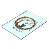 Niedliches Schwarzes Kätzchen beim Stern Notizblock (Linke Seite)