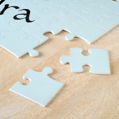 Niedliches Schwarzes Kätzchen beim Stern Puzzle (Seite)