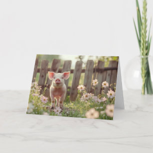 Niedliches Schwein im Blumengarten Karte