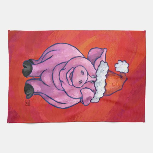 Niedliches Schwein in Weihnachtsmannmütze auf Rot Handtuch (Horizontal)