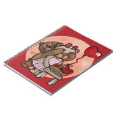 Niedliches Teddypärchen in einem roten Spiralheft Notizblock (Linke Seite)