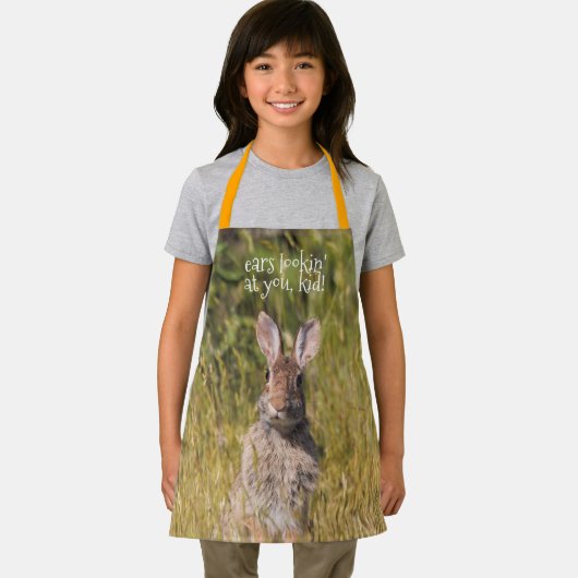 Niedliches und neugieriges Ostküstenkaninchen Schürze (Insitu)