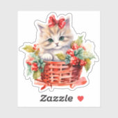 Niedliches Weihnachtskätzchen in einem Korb mit La Aufkleber (Blatt)