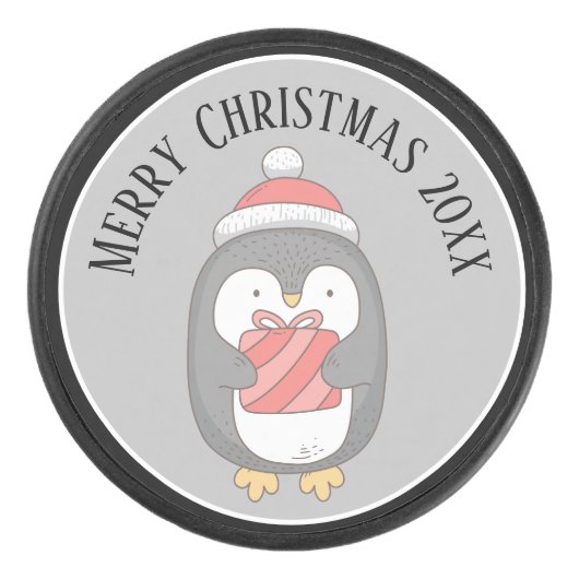 Niedliches Weihnachtspenquin mit Hut und Packung Eishockey Puck (Vorderseite)