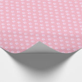 Niedliches weißes Pfotenmuster auf rosa Geschenkpapier (Ecke)