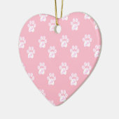 Niedliches weißes Pfotenmuster auf rosa Keramikornament (Links)