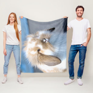 Niedliches weißes und braunes Kaninchen aus Flande Fleecedecke