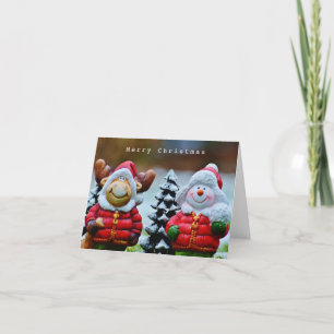 Niedliches Winterschneepuppel mit Scarves Holiday Feiertagskarte
