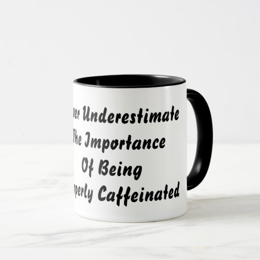 Niemals unterschätzen tasse (VorderseiteRechts)