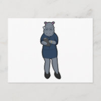 Nilpferd als Sekretär mit Notizblock und Stift