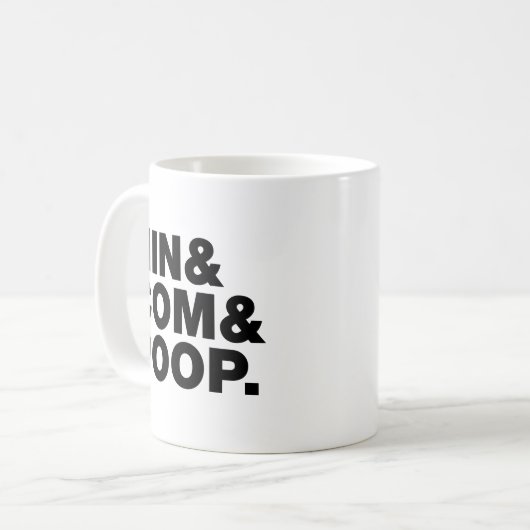 NIN & COM & KACK. KAFFEETASSE (Vorderseite Links)