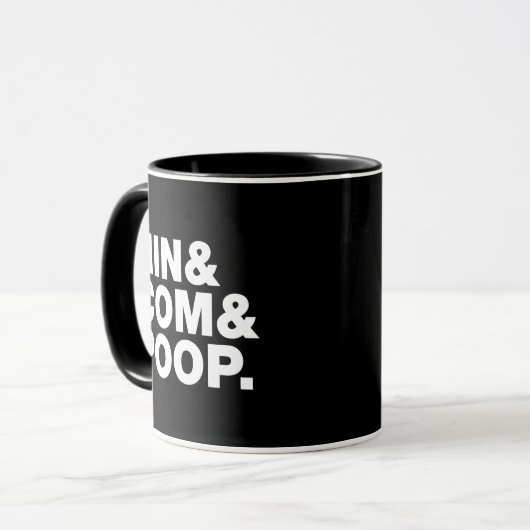 NIN & COM & KACK. TASSE (Vorderseite Links)