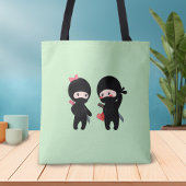 Ninja Pair, ein Junge und ein Mädchen auf Grün Tasche