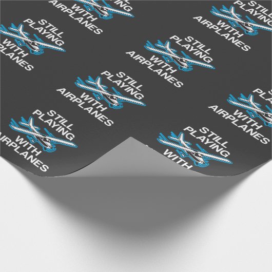 Noch, spielend mit geschenkpapier (Ecke)