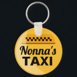 Nonna's Taxi Keychain Schlüsselanhänger<br><div class="desc">Nonna busy driving the grandkids around enough to warrant recognition as a taxi service? This is the perfect,  funny gift for her. Yellow and black taxi-style emblem with words,  "Nonna's Taxi" in black" features digitally rendered highlight and checkered pattern icon above title.</div>