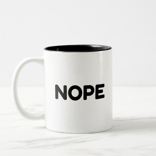 NOPE ZWEIFARBIGE TASSE (Links)