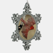 NordKardinal im Flug Schneeflocken Zinn-Ornament (Links)