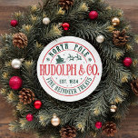 NORTH POLE RUDOLPH SANTA SLEIGH CHRISTMAS RUNDER AUFKLEBER<br><div class="desc">Sind Sie bereit, Ihre Feiertage mit dem Zauber des Weihnachtsmannes und seiner Rentiere zu bereichern? Sehen Sie nur unsere runden Aufkleber mit einem wunderschönen Santa Sleigh und Rentierern mit Zitat: "North Pole FINE REINDEER LECKEREIEN." Diese Aufkleber sind die perfekte Ergänzung zu Ihren Weihnachtsfeiern und verbinden festlichen Charme mit einer schnellen...</div>