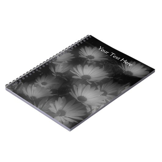 Notebook-Blume mit schwarzem und weißem afrikanisc Notizblock (Linke Seite)