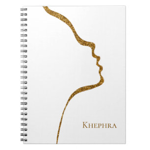 Notebook mit weißem und goldenem Glitzer Notizblock