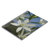 Notebook mit weißer Blume Notizblock (Linke Seite)