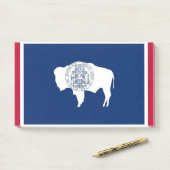 Notizen unter der Flagge von Wyoming, USA (Auf Schreibtisch)
